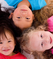 stock photo three young children smiling